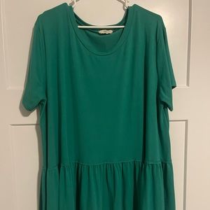 Women’s crew neck short sleeve ruffled hem top